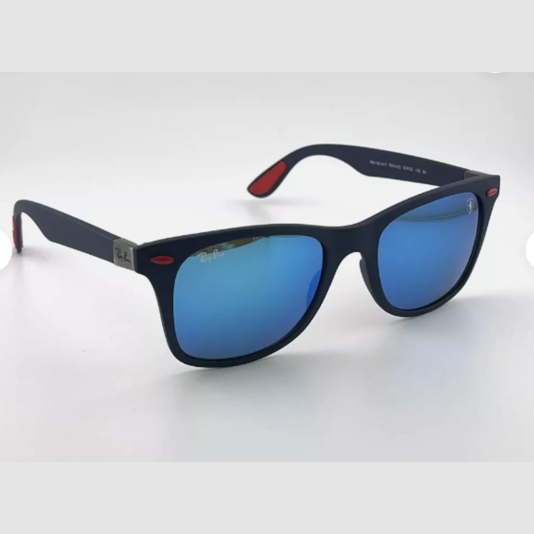 Inspirados en la velocidad y la elegancia de la Fórmula 1, los Ray-Ban Wayfarer Scuderia Ferrari ofrecen lentes en negro o azul con patillas combinadas: rojo + color del lente. Un diseño dinámico, moderno y 100% original.