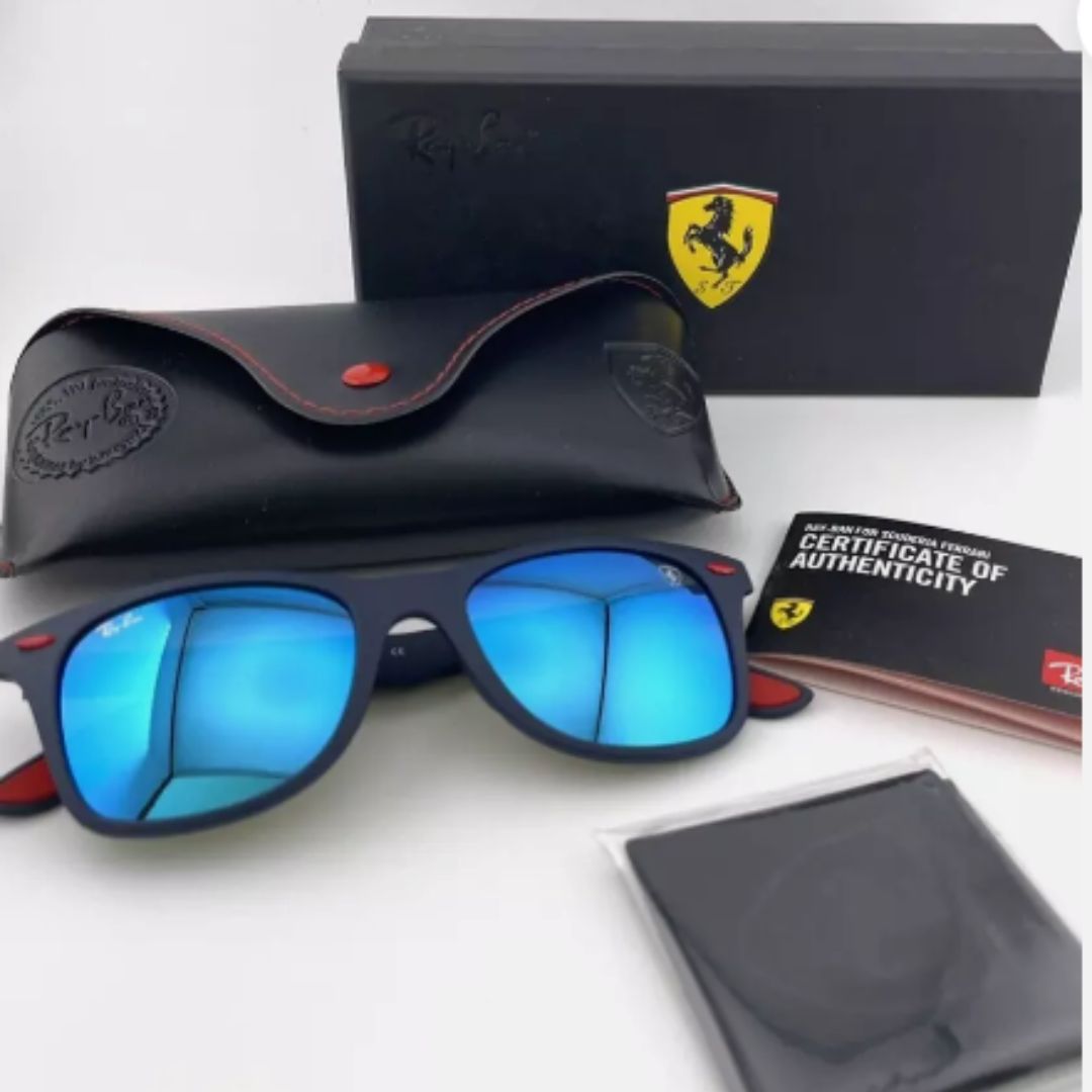 Inspirados en la velocidad y la elegancia de la Fórmula 1, los Ray-Ban Wayfarer Scuderia Ferrari ofrecen lentes en negro o azul con patillas combinadas: rojo + color del lente. Un diseño dinámico, moderno y 100% original.