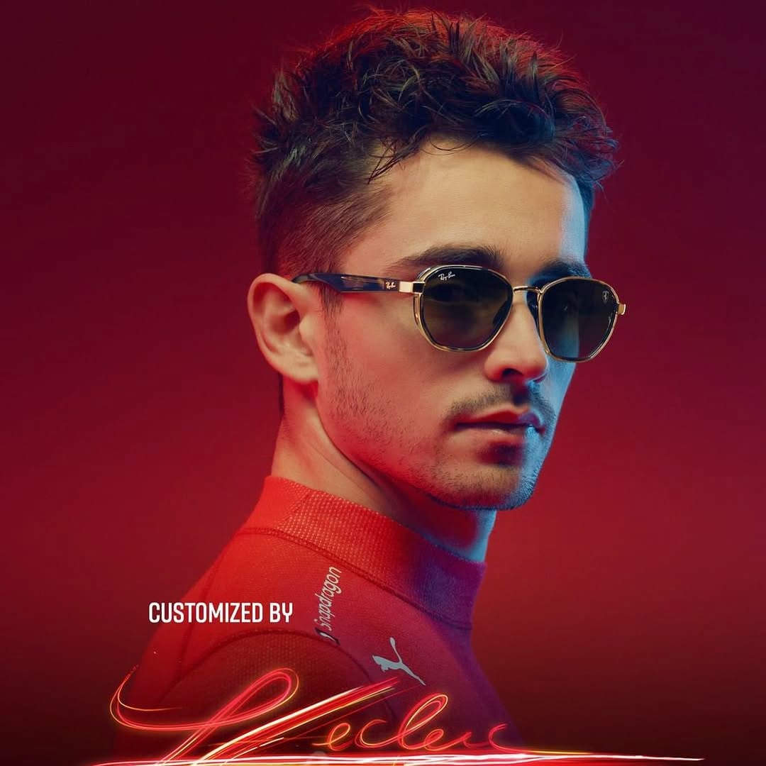 Ray-Ban Ferrari RB3674M con armazón marrón havana, detalles dorados y lentes espejadas. Estilo deportivo, elegante y con sello Ferrari.